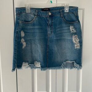 Distressed denim miniskirt